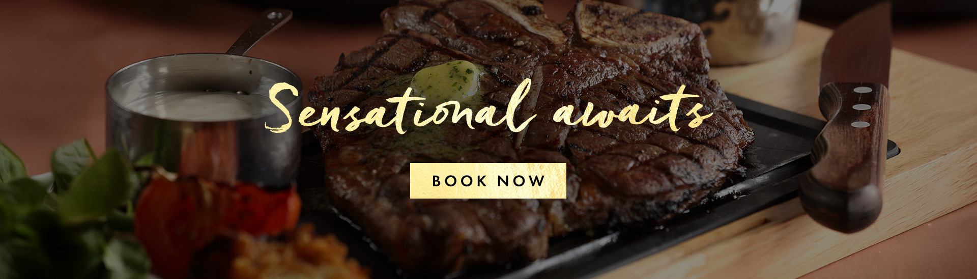 Grilled steak from the Miller & Carter main menu, served with a lettuce wedge, grilled tomato and steak sauce. 